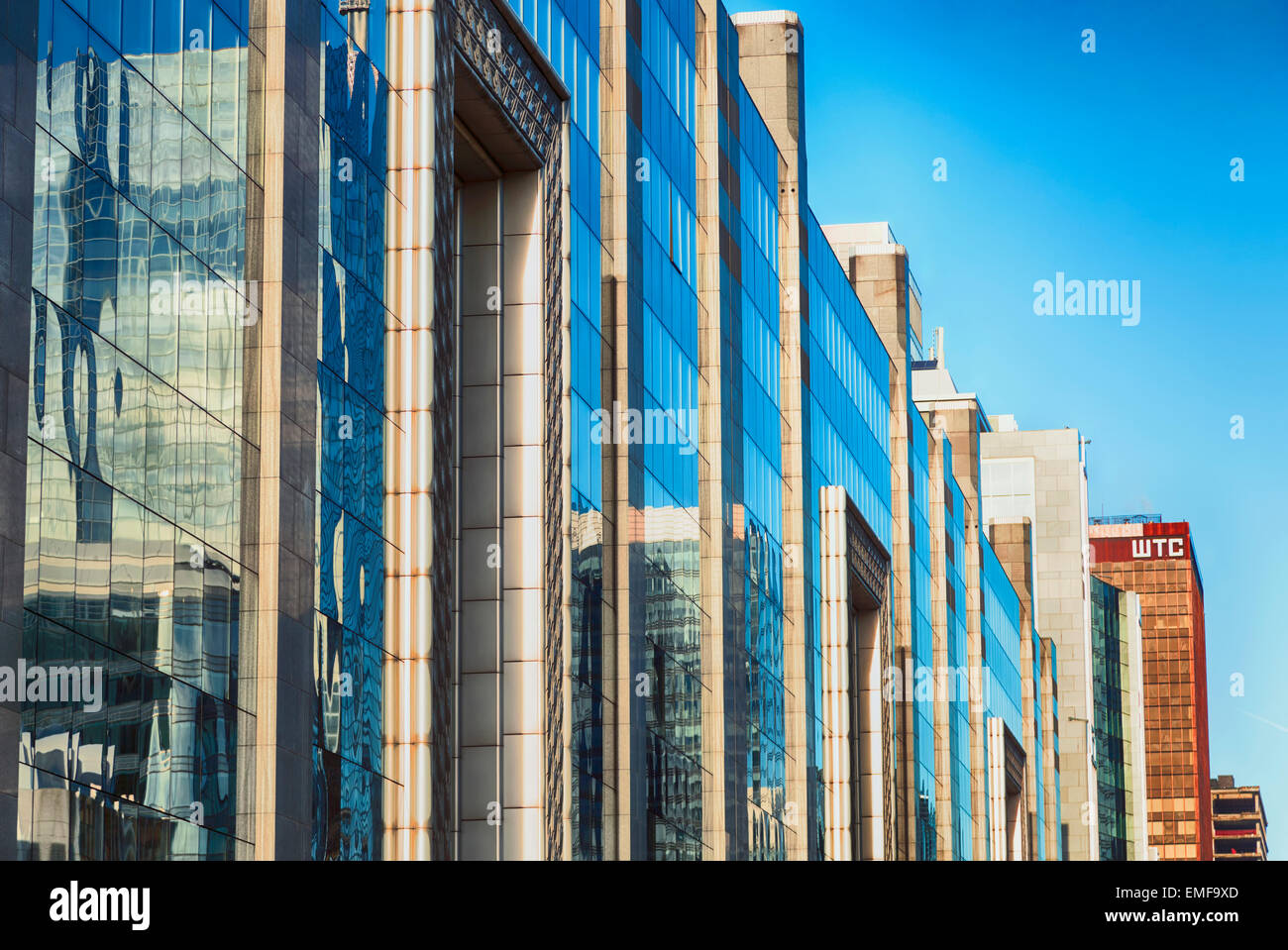Skyscrapers against blue sky and clouds Stock Photo - Alamy