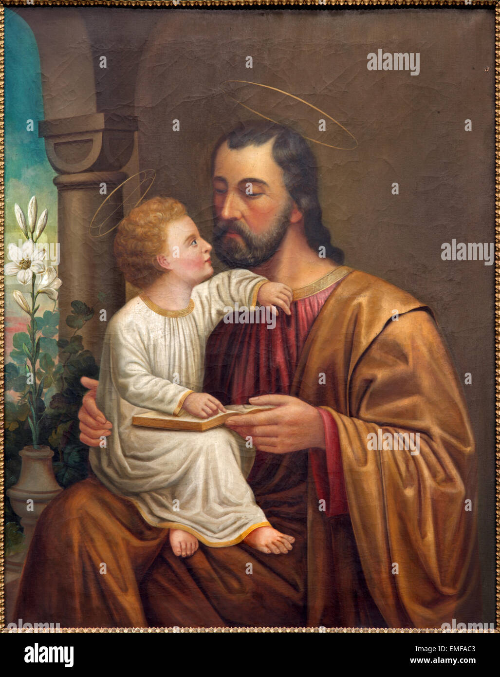 VIENNA, AUSTRIA - DECEMBER 17, 2014: The St. Joseph paint on the side altar of Salesianerkirche by unknown artist of 19. cent. Stock Photo