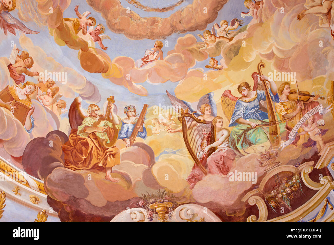 Banska Stiavnica - Angels with the music instruments fresco on cupola in the middle church of baroque calvary. Stock Photo