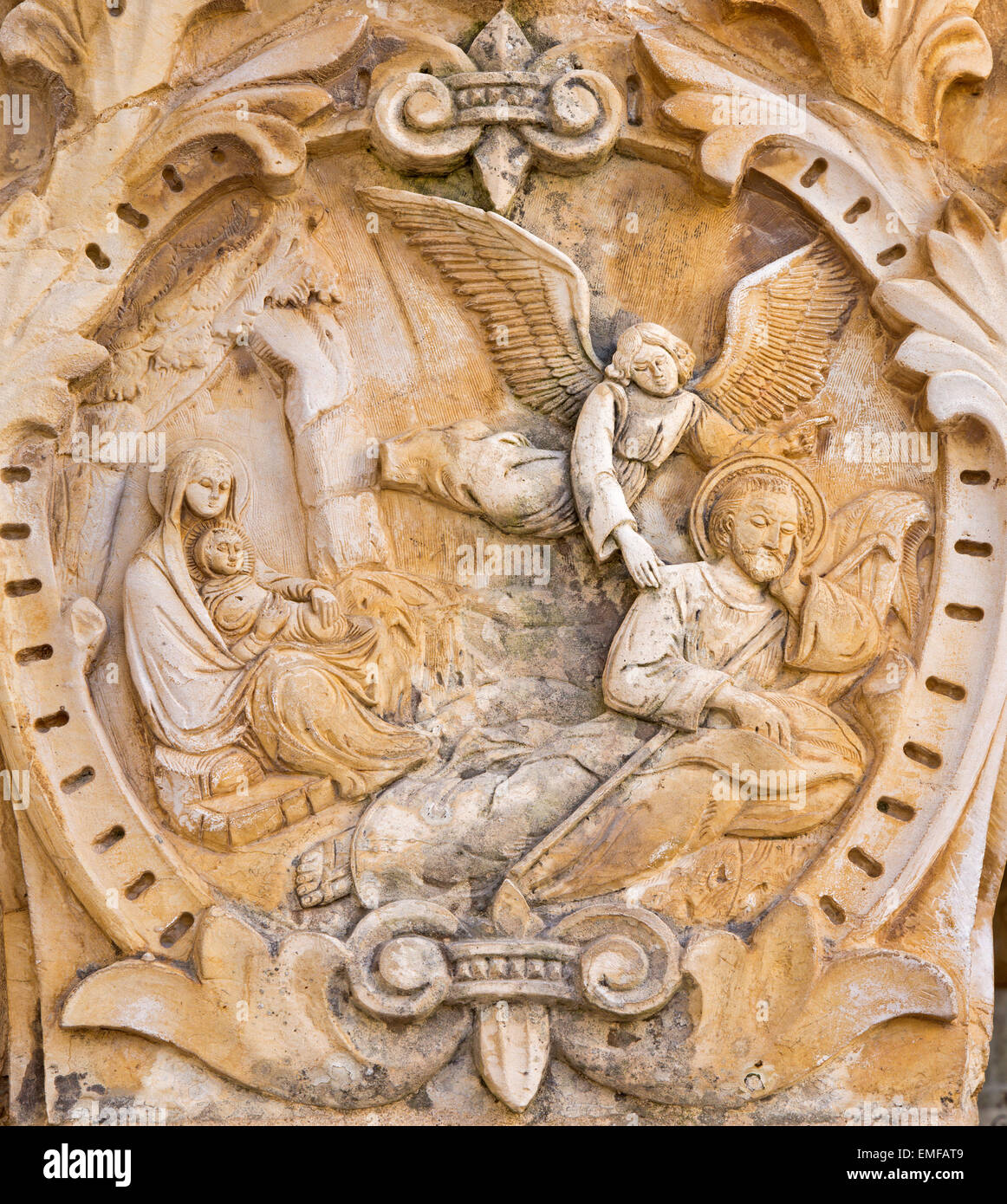 BETHLEHEM, ISRAEL - MARCH 6, 2015: The Madonna angel and shepherd. The relief on the portal in chapel of  'Milk Grotto' cave. Stock Photo