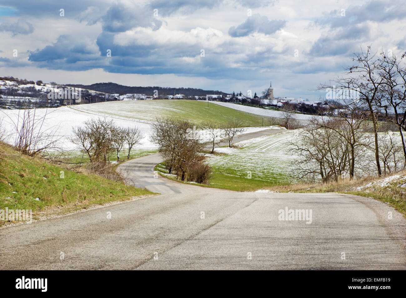 Slovakia - The road in the spring country of Silicka Planina plateau. Stock Photo