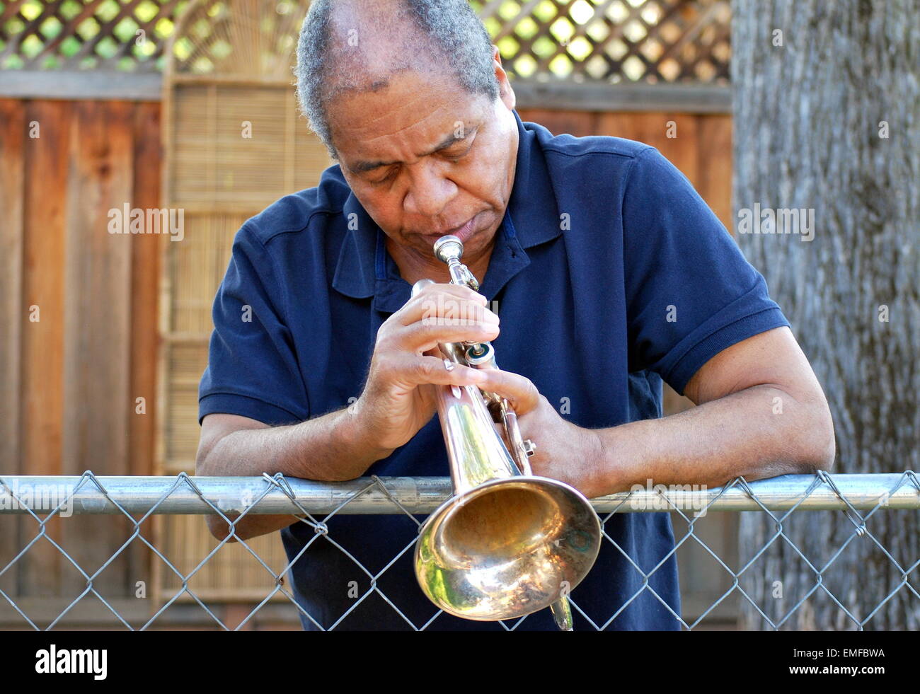 Jazz musician blowing his flugelhorn Stock Photo Alamy