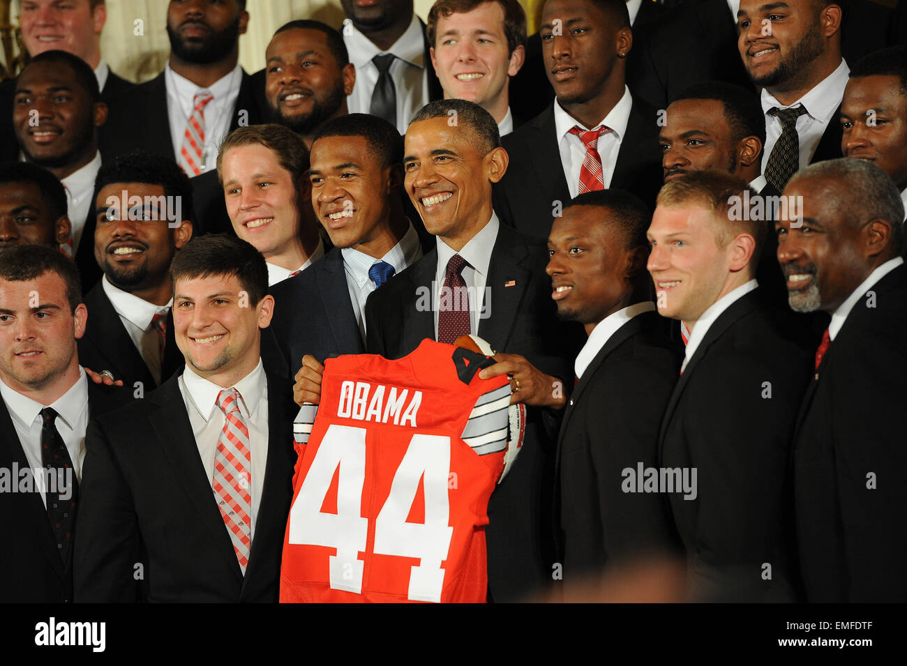 Washington, District Of Columbia, USA. 20th Apr, 2015. PRESIDENT OBAMA is given an Ohio State football jersey by The Ohio State University Buckeyes football team in honor of the team on winning the first ever College Football Playoff National Championship The event took place in the East Room of the White House Credit:  Ricky Fitchett/ZUMA Wire/Alamy Live News Stock Photo