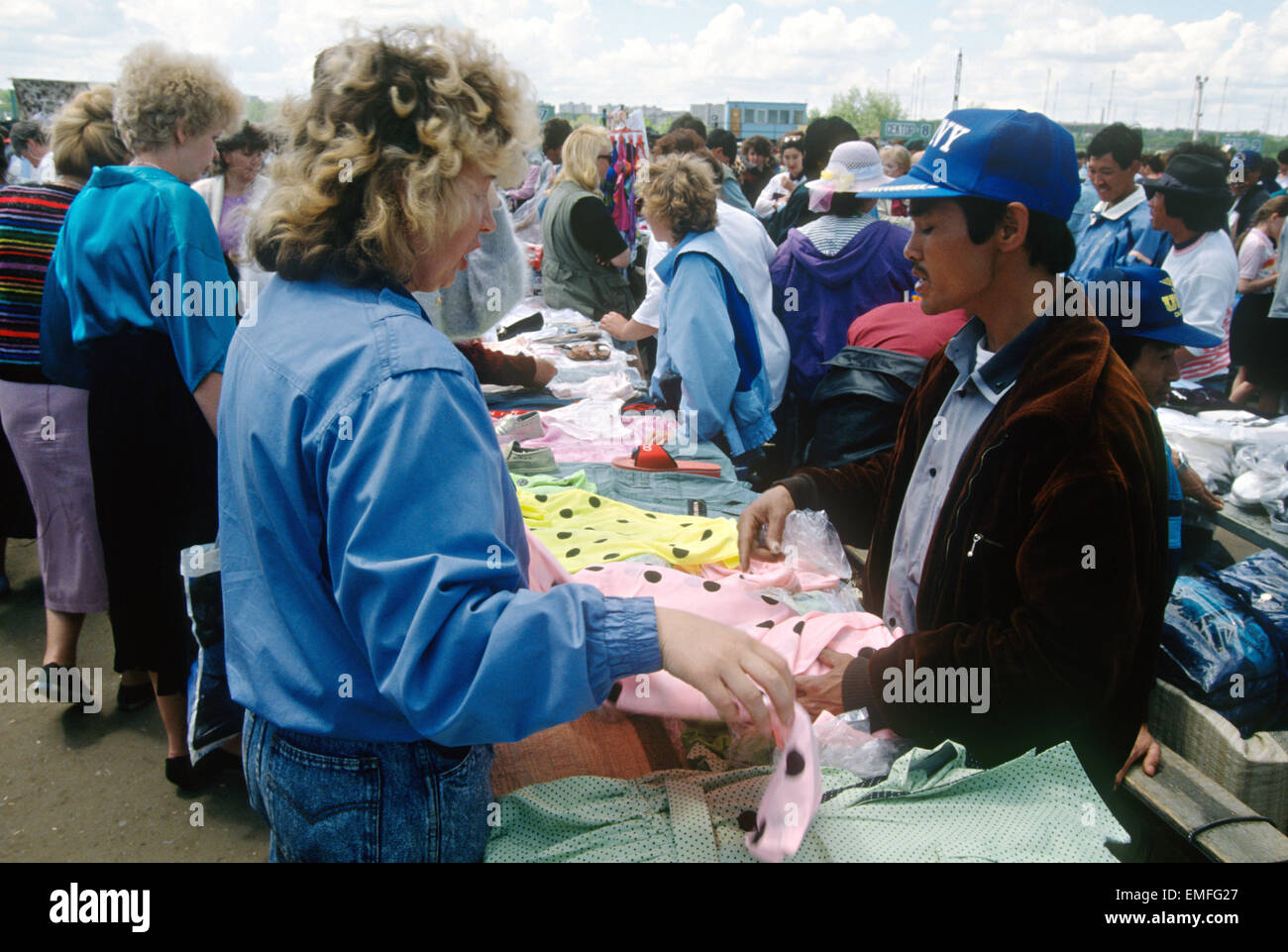 Illegal Chinese vendors sell cheap goods in an open air market to