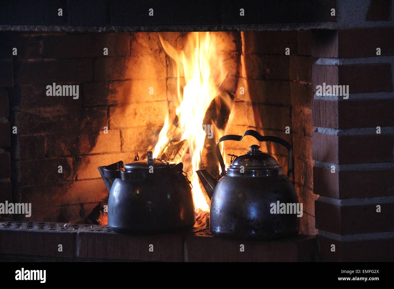 Kettle Boiling Fireplace Stock Photos & Kettle Boiling Fireplace Stock