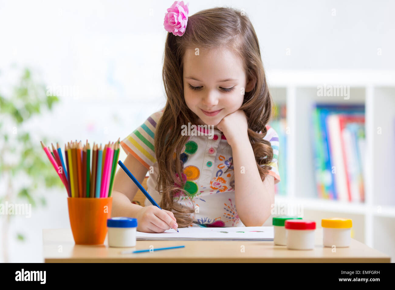 Cute little preschooler child drawing at home Stock Photo - Alamy
