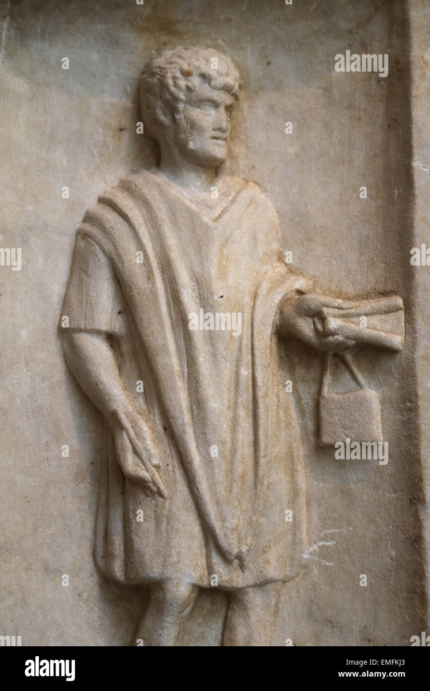Funerary relief of Publius Sextilius Fortunatus. Roman, ca. AD 120-150. Young freedman with stylus and papyrus scroll. Stock Photo