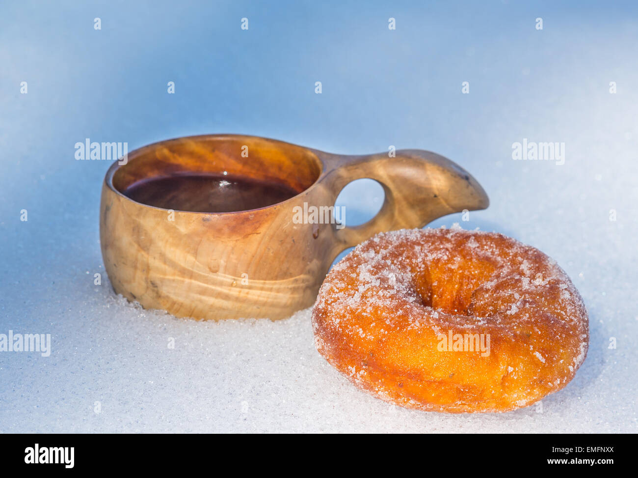 Coffee on wooden cup and baked doughnut Stock Photo