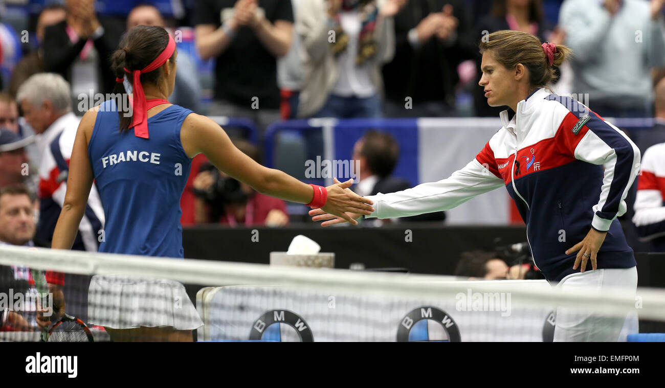 French tennis player Caroline Garcia (left) and captain Amelie Mauresmo  during the break in the semifinal Czech Republic vs. France Fed Cup match  against Petra Kvitova in Ostrava, Czech Republic, April 19,