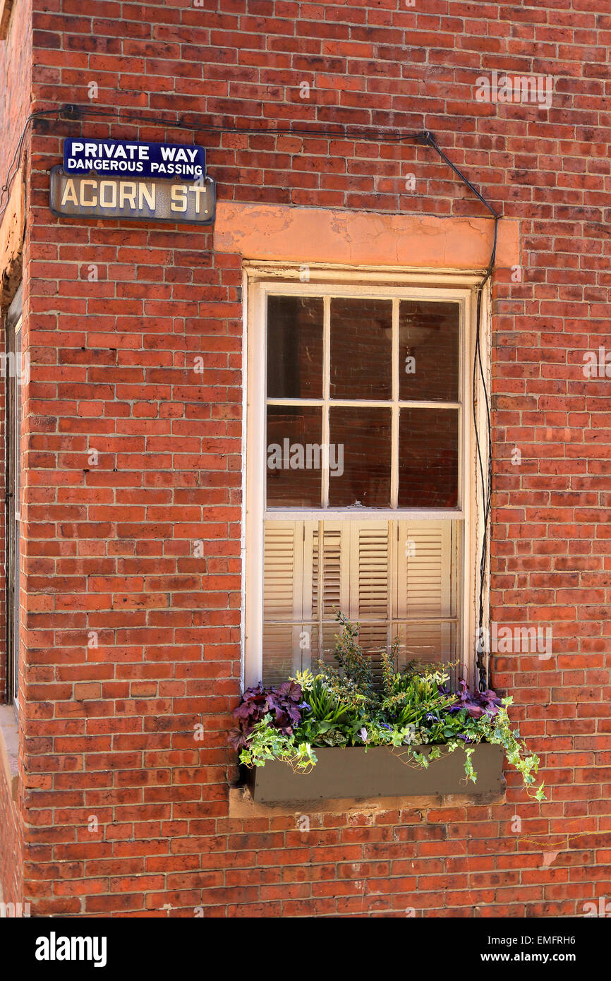Boston Beacon Hill Acorn Street sign landmark with cobblestone. Stock Photo