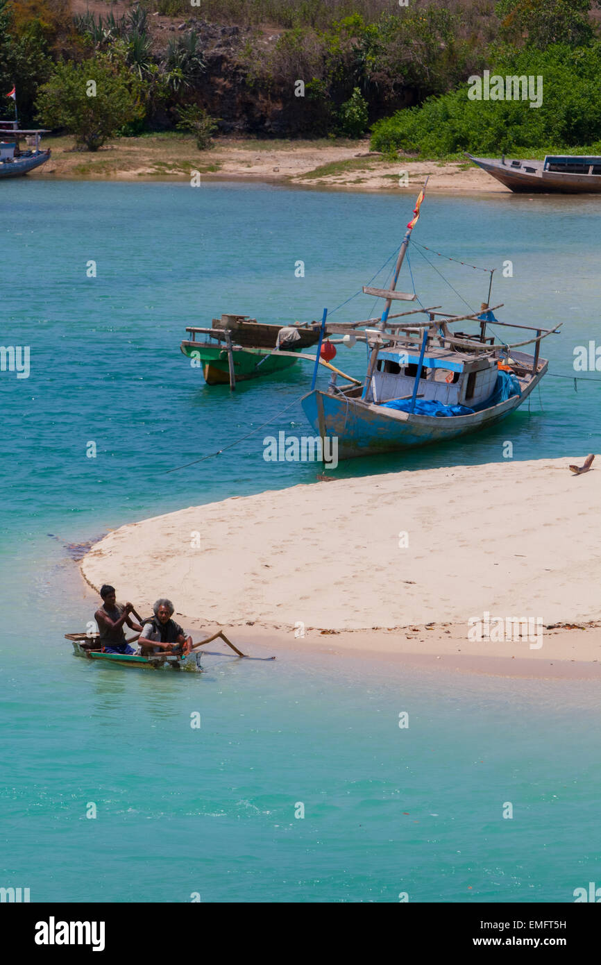Fishing boats on the beach of Pero, in Pero, a fishing village in Kodi, Southwest Sumba, East Nusa Tenggara, Indonesia. Stock Photo