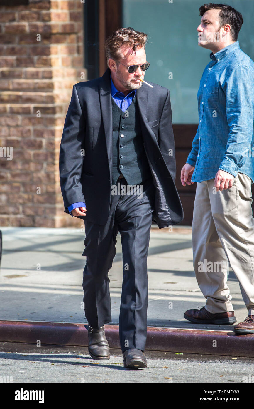 John Mellencamp smoking a cigarette outside a hotel in the Tribeca  neighbourhood of Manhattan Featuring: John Mellencamp Where: New York City,  New York, United States When: 16 Oct 2014 Stock Photo