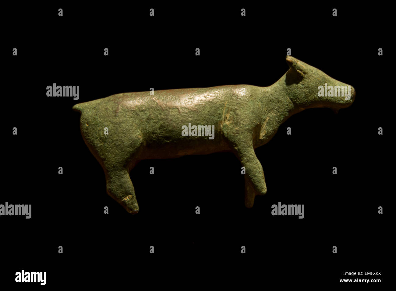 Votive offering figurine with the shape of a goat. Molten bronze. 5th-4th century b.C. Stock Photo