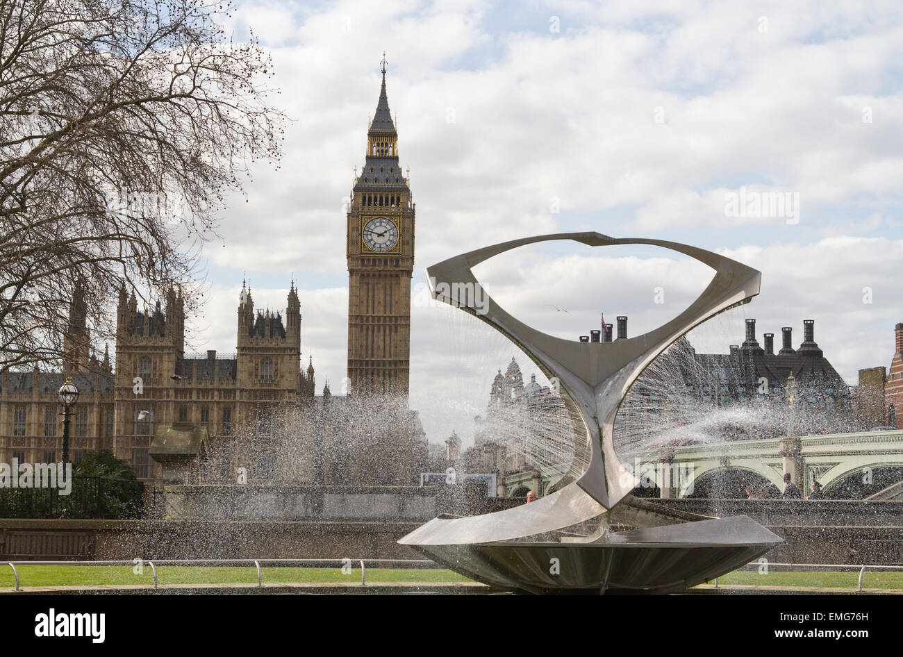 Big Ben and the Houses of Parliament behind a fountain sculpture. Stock Photo