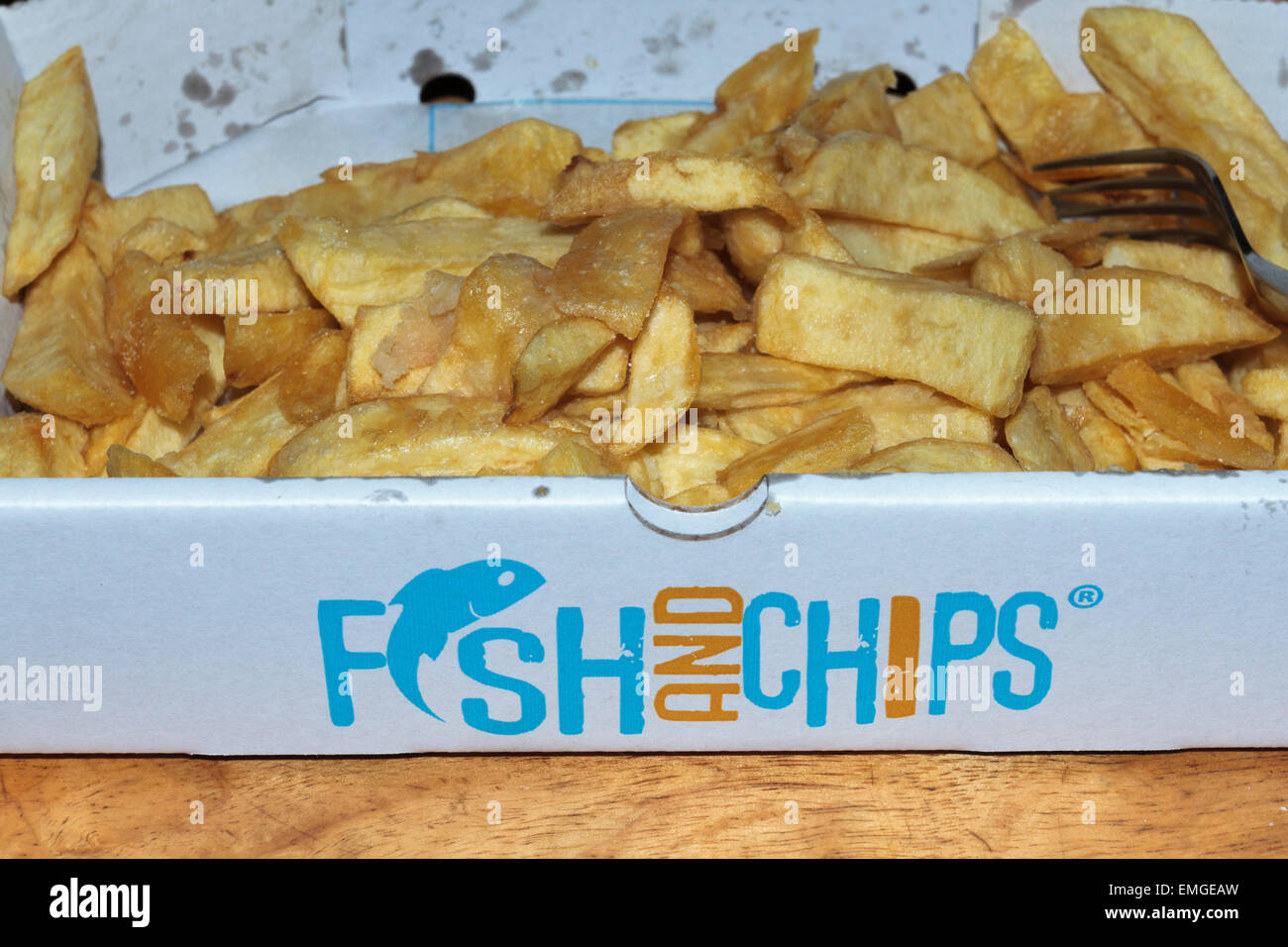 Box of chips from a take away fast food outlet, England, UK Stock Photo