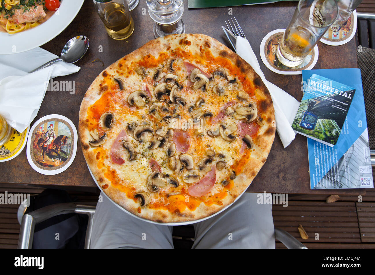 Ham and mushroom pizza and drinks, Cafe Bar Celona, Wuppertal, Nordrhein-Westfalen, Germany Stock Photo