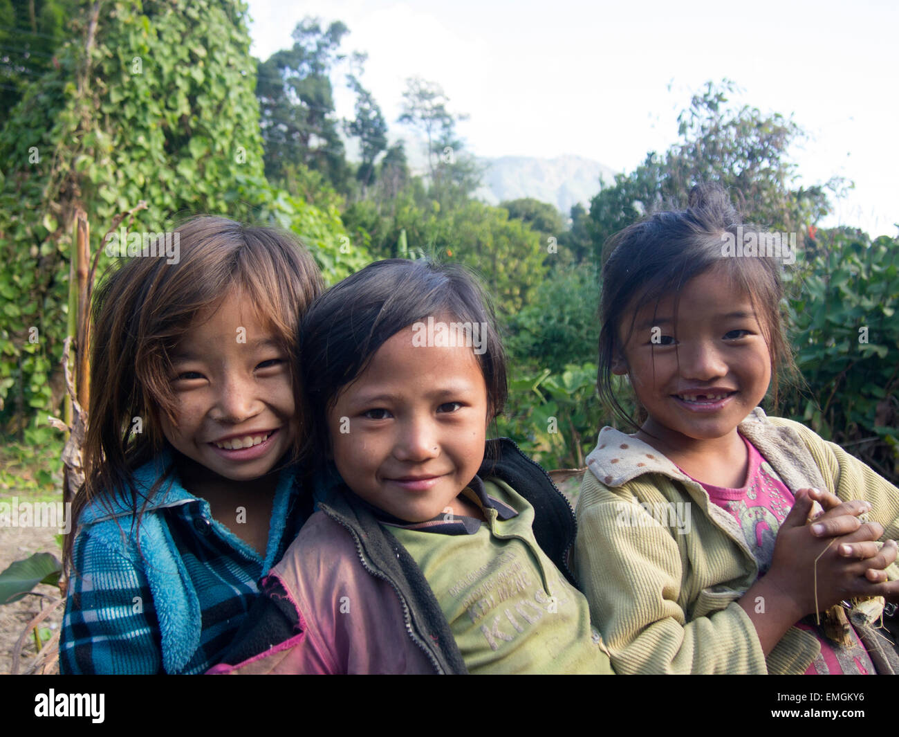 Young children smiling happy Lukla Nepal Asia Stock Photo
