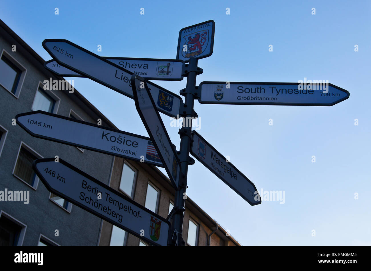 Street sign showing distances to European cities, and South Tyneside, Wuppertal, Nordrhein-Westfalen, Germany Stock Photo