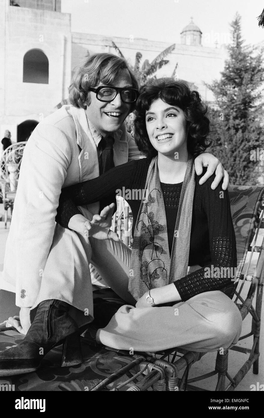 Actor Michael Caine with Nadia Cassini on the set of their new film Pulp during filming in Malta. 17th January 1972. Stock Photo