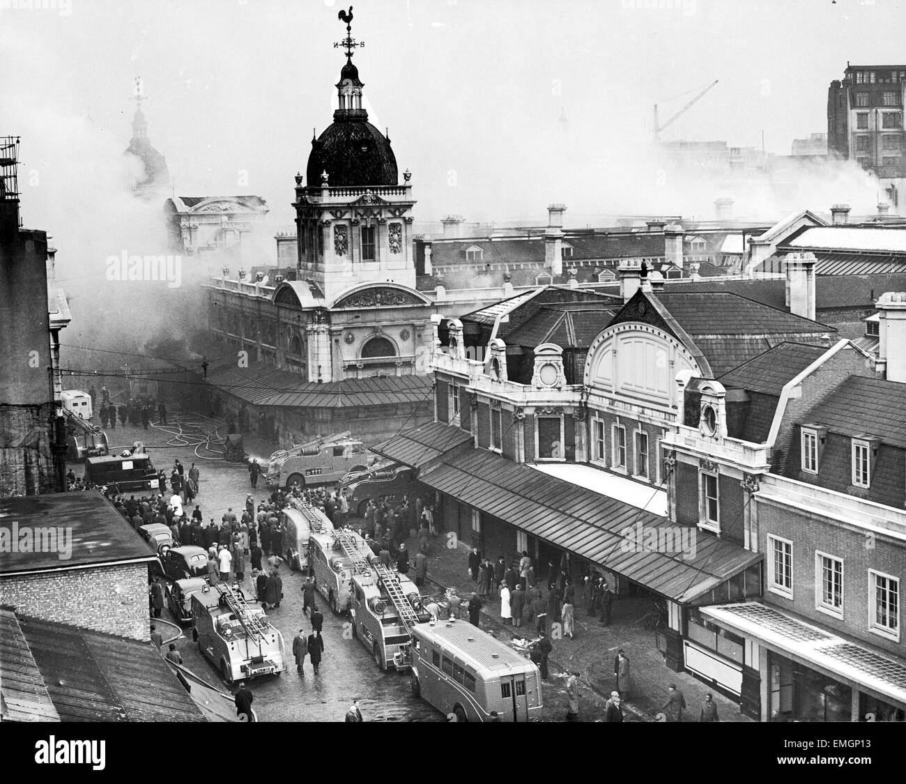 Emergency services including the Police and London Fire Brigade at the scene of a fire at Smithfield meat Market in London 23rd January 1958. Stock Photo