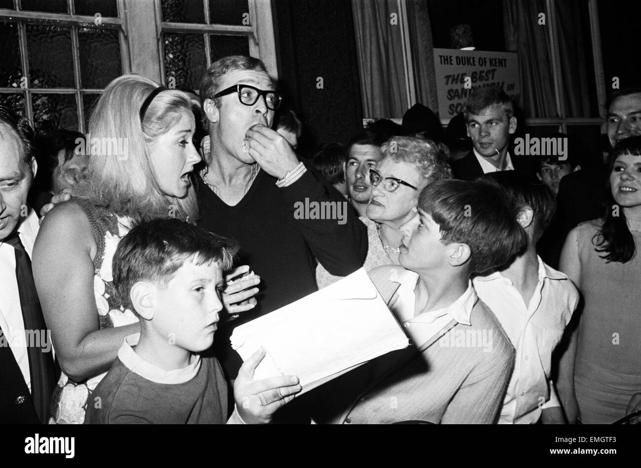 Linda Bird Johnson, daughter of the US President, at a party in a pub on Old Kent Road with Michael Caine and Liz Frazer in attendance. 26th July 1967 Stock Photo