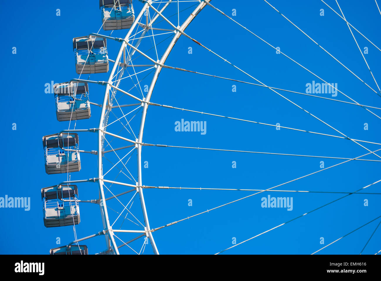 White ferris wheel against blue sky Stock Photo - Alamy