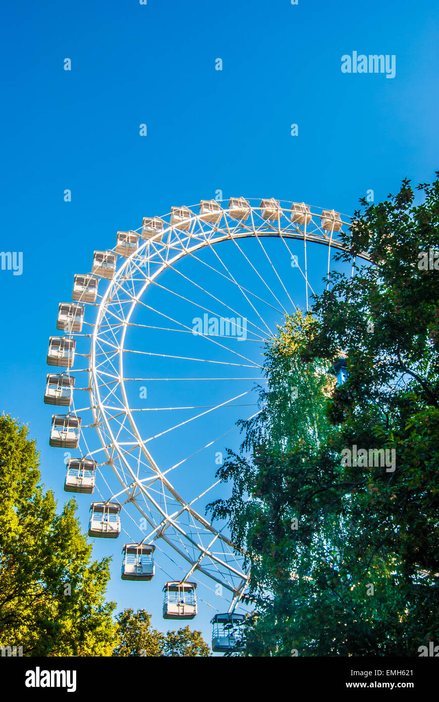 White ferris wheel against blue sky Stock Photo - Alamy