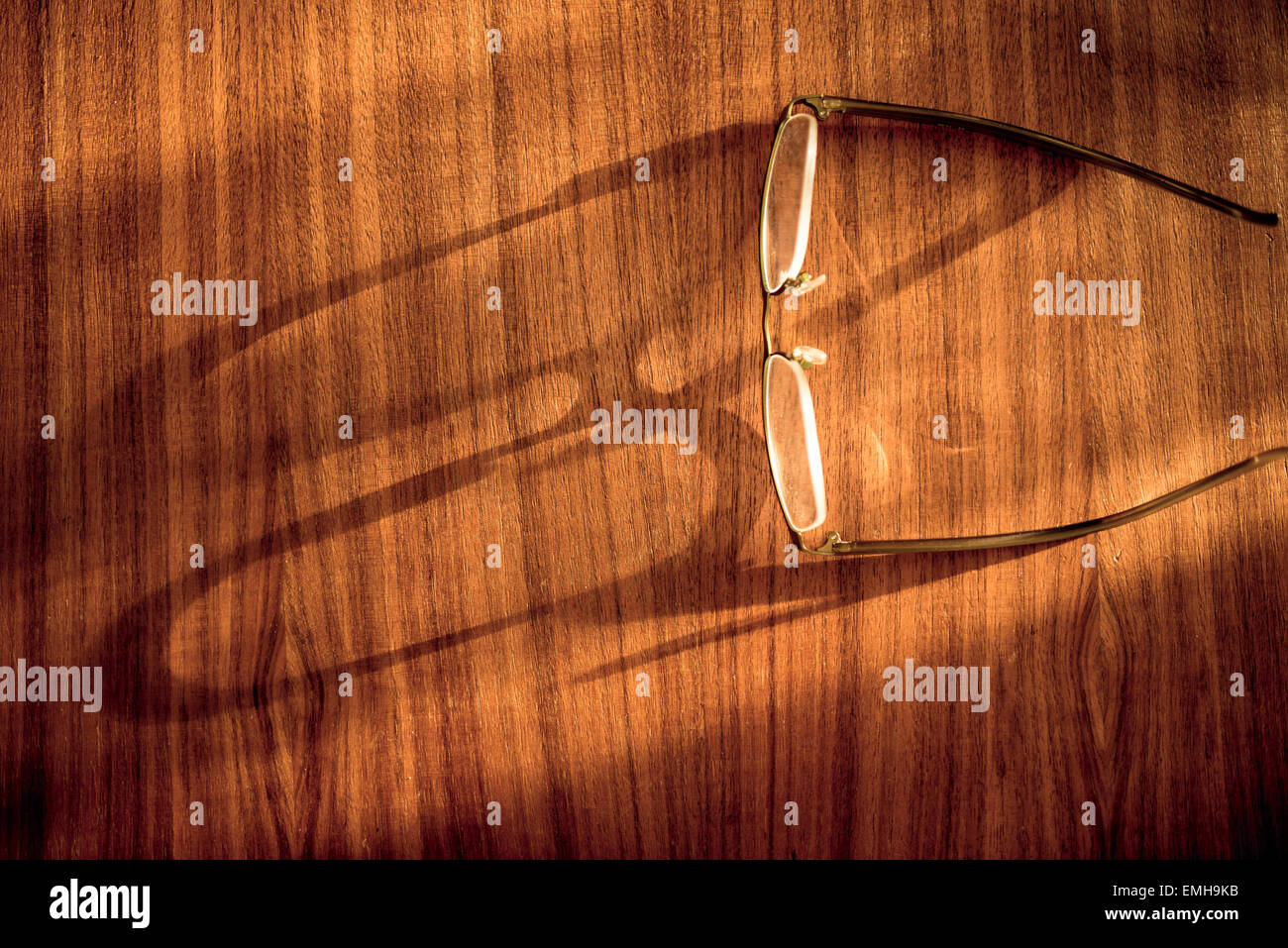 Eyeglasses surface table shadows hi-res stock photography and images ...