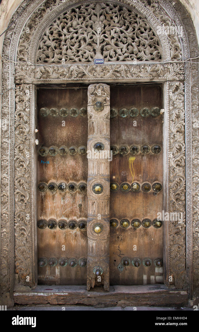 Carved wooden doors of stone town Stock Photo - Alamy