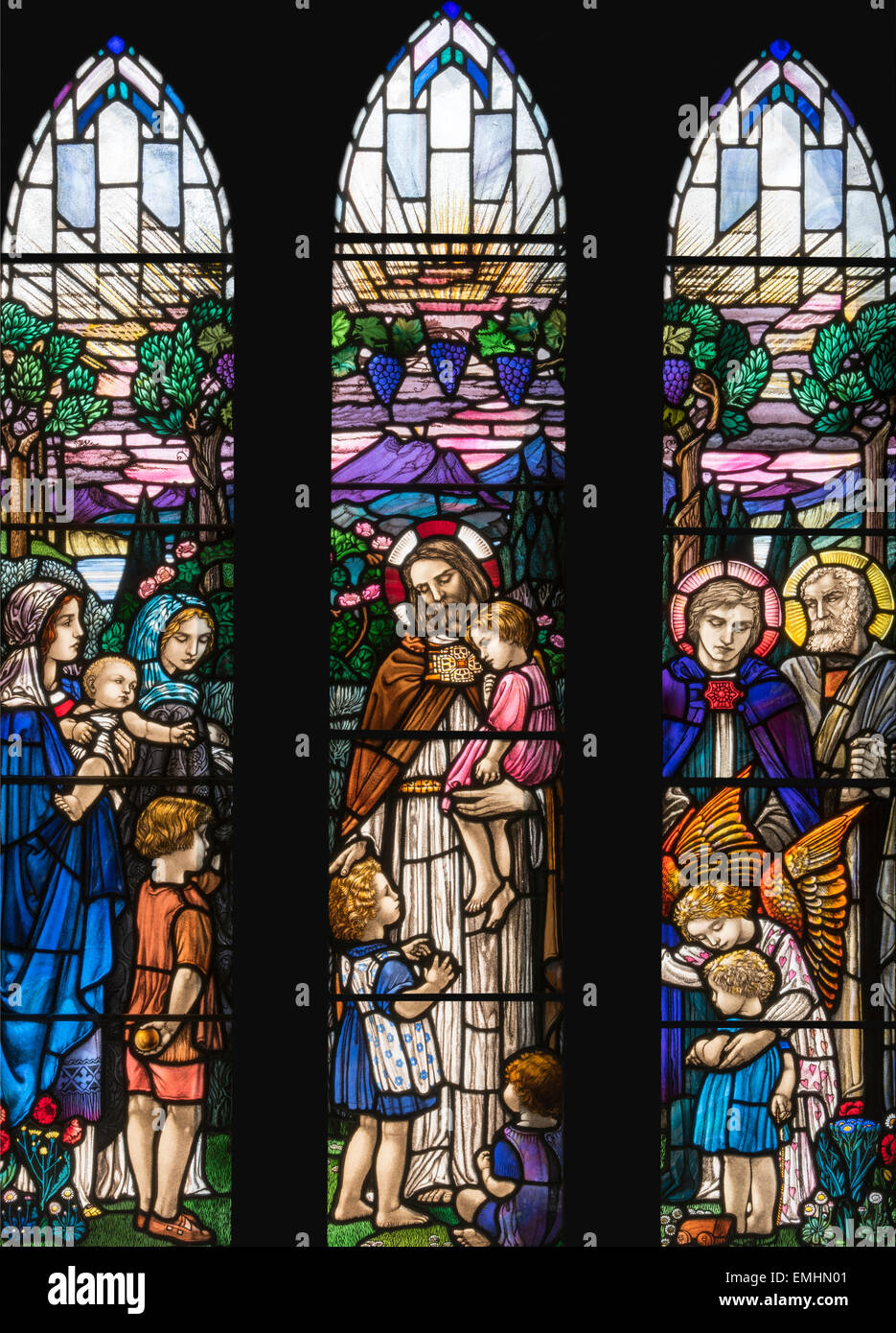 An Arts and Crafts memorial window by Veronica Whall in the Parish Church of Keswick St. John, Cumbria, England, UK Stock Photo