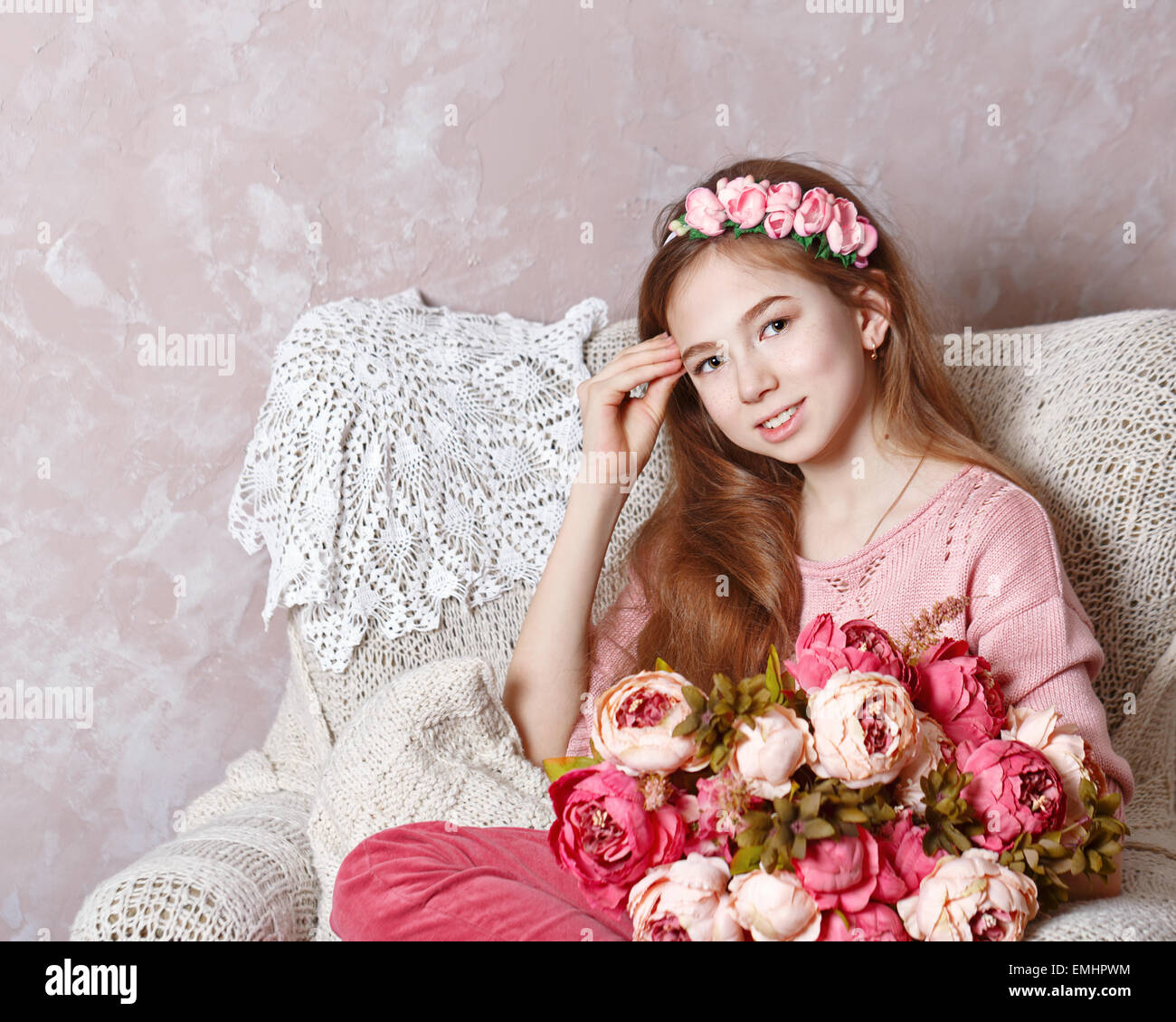 Teen girl with a bouquet of flowers Stock Photo - Alamy