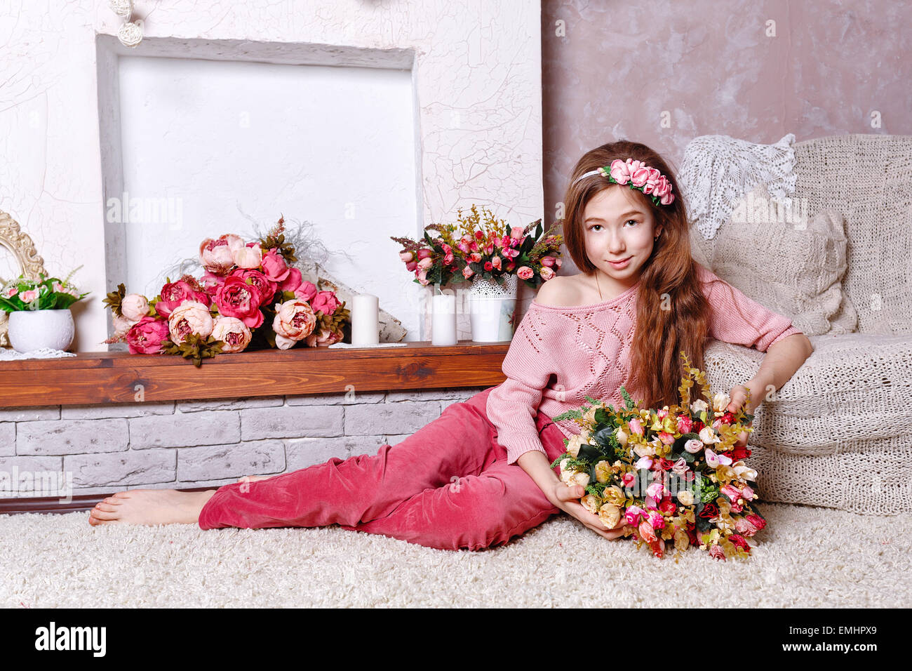 Teen girl with a bouquet of flowers Stock Photo - Alamy