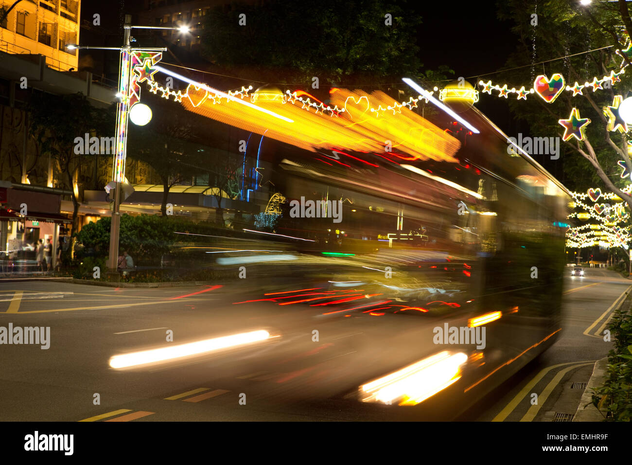 Busy street of Singapore with Christmas lights and decorations Stock Photo