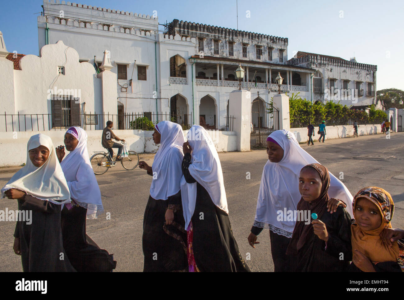 students in traditional dresses in Zanzibar Stock Photo Alamy