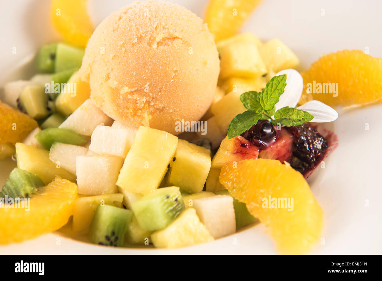 Salad plate with different kinds of fruit andicecream Stock Photo