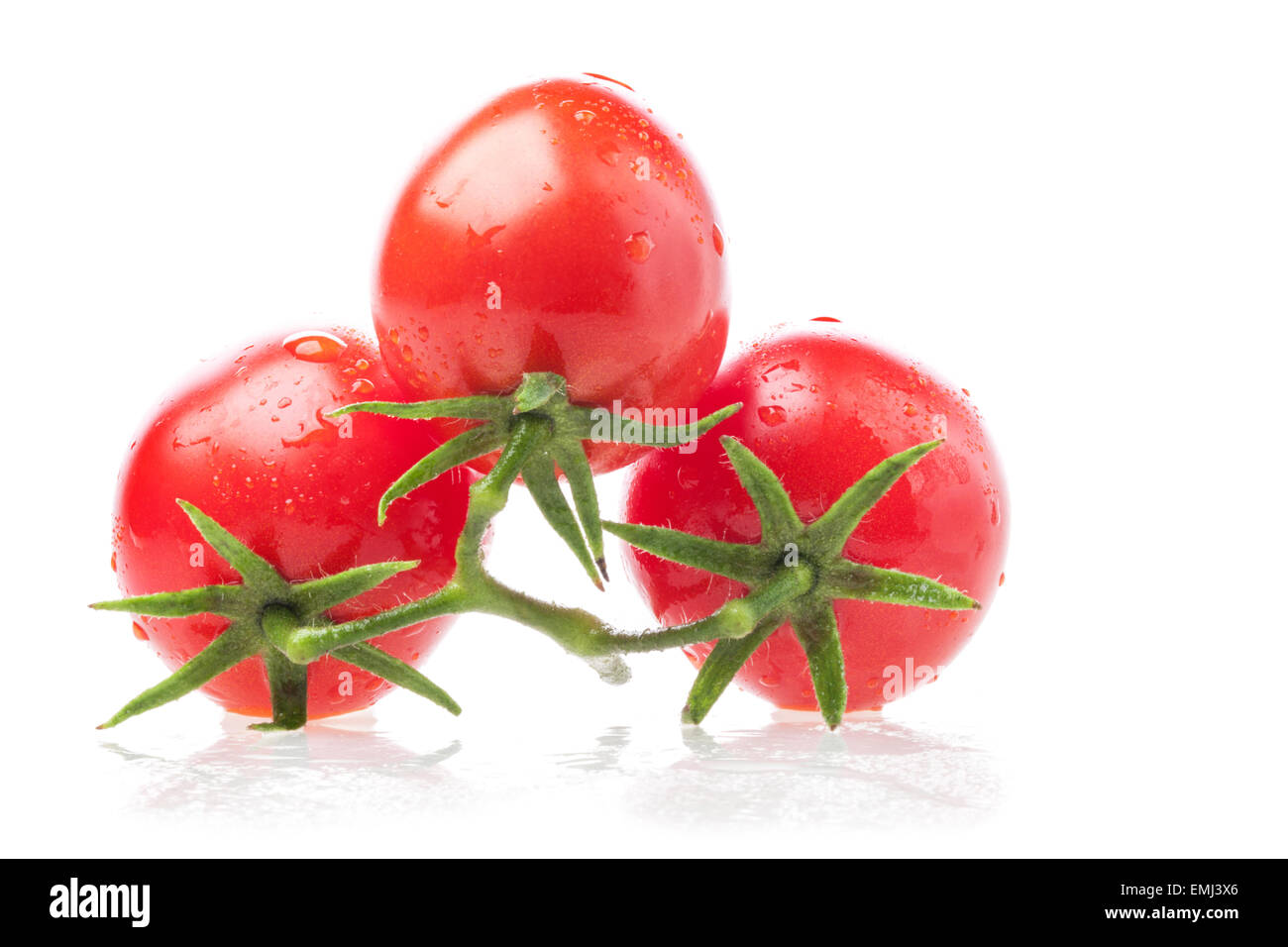 Tomatoes isolated on white background Stock Photo - Alamy
