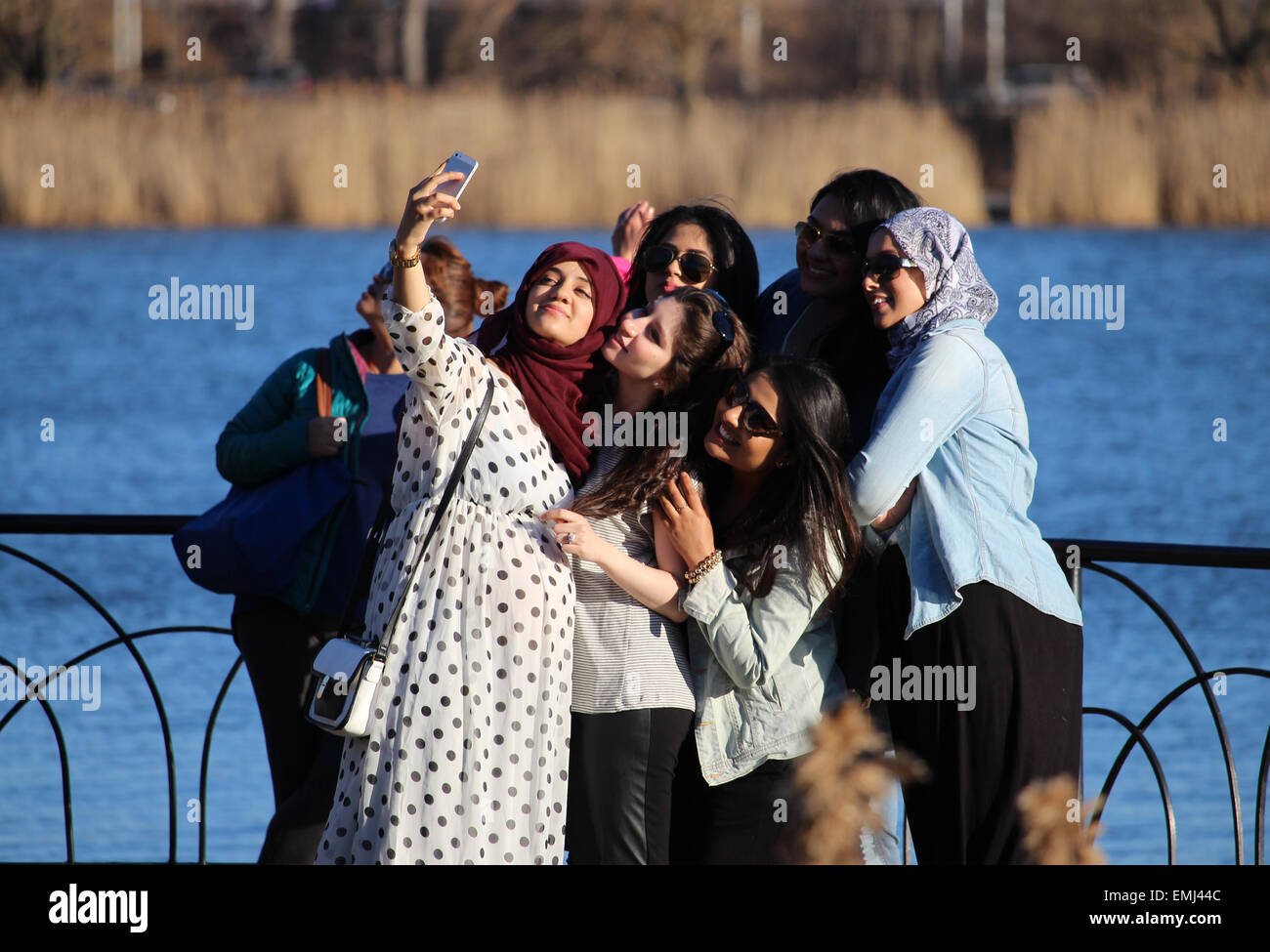 A Group Of Female Friends Taking A Selfie Near A Pond Stock Photo Alamy