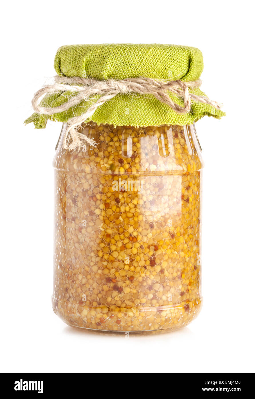 Mustard sauce in glass jar isolated on white Stock Photo Alamy