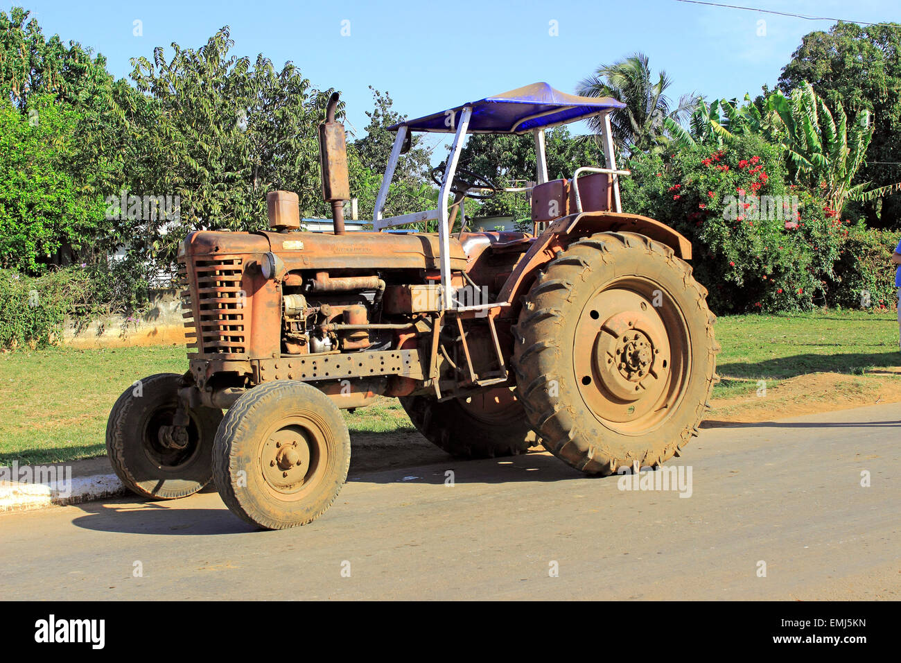 older model Russian made tractor a common farm machine Playa Giron Cuba Stock Photo