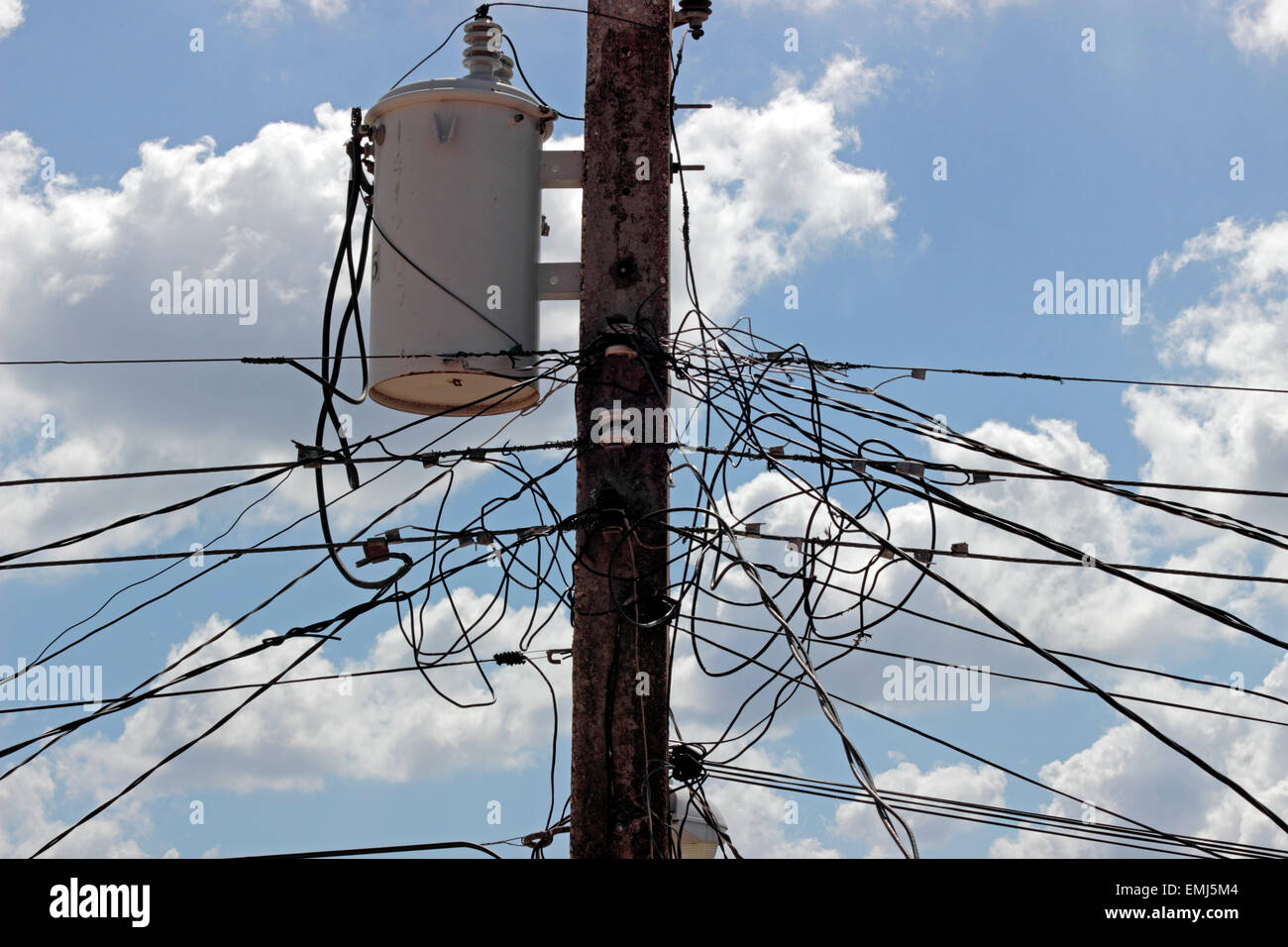 Multiple Electric wires and transformer on a pole Zapata Peninsula Cuba Stock Photo