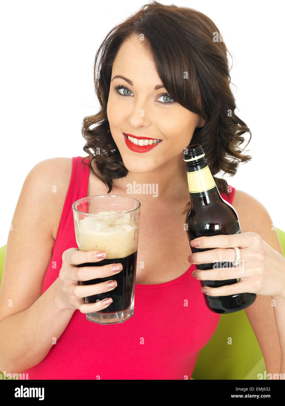 Two tall elegant pint glasses of cold wheat beer with a frothy head on a  wooden bar table conceptual of Oktoberfest Stock Photo - Alamy