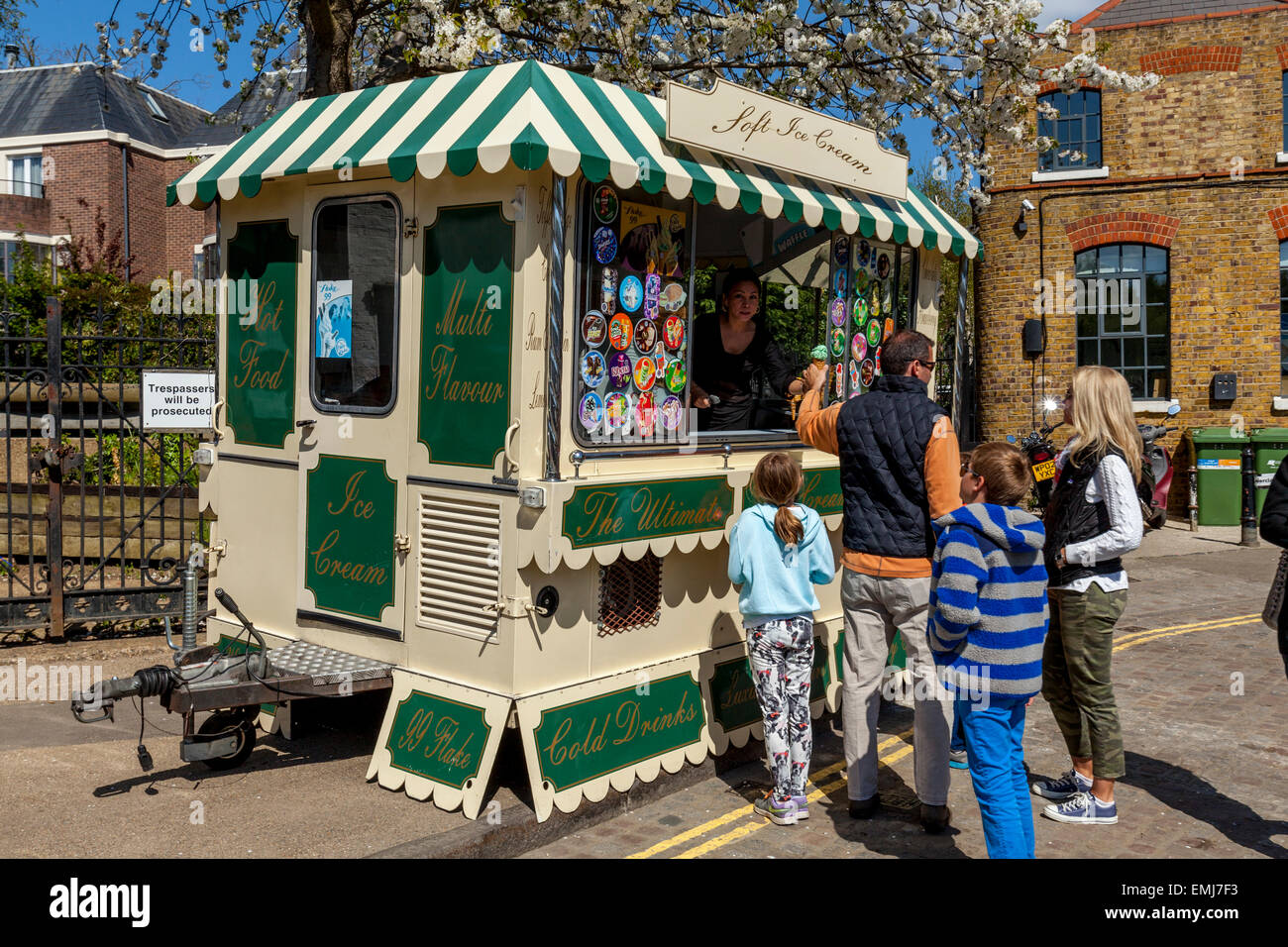 A Family Buying Ice Creams From a Traditional Ice Cream Van, Richmond Upon Thames, London, England Stock Photo
