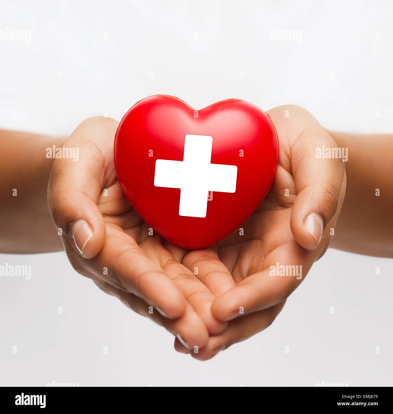female hands with red heart Stock Photo - Alamy