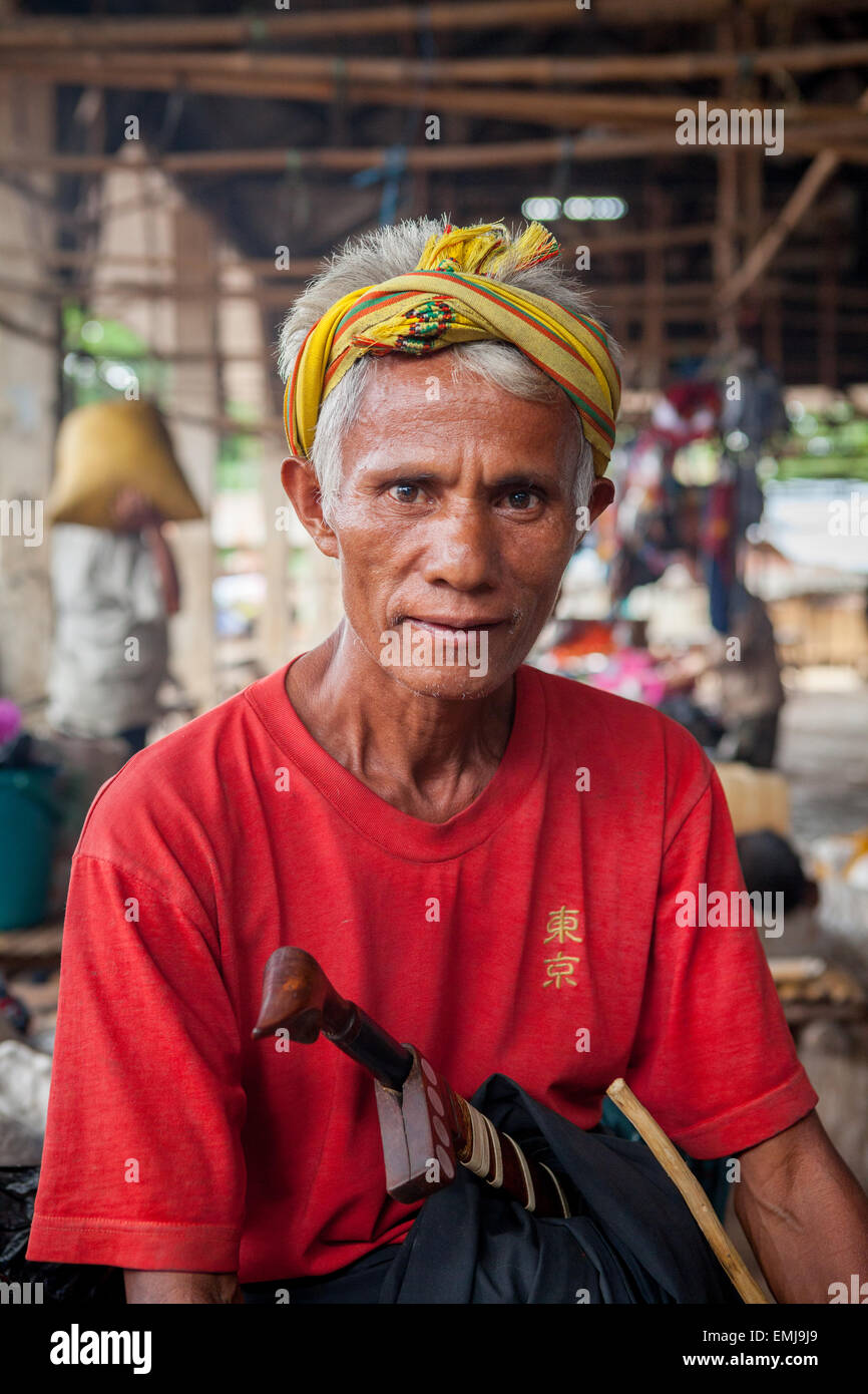 Portrait of a shopper at a traditional market in Waibakul, Anakalang, Katikutana, Central Sumba, East Nusa Tenggara, Indonesia. Stock Photo