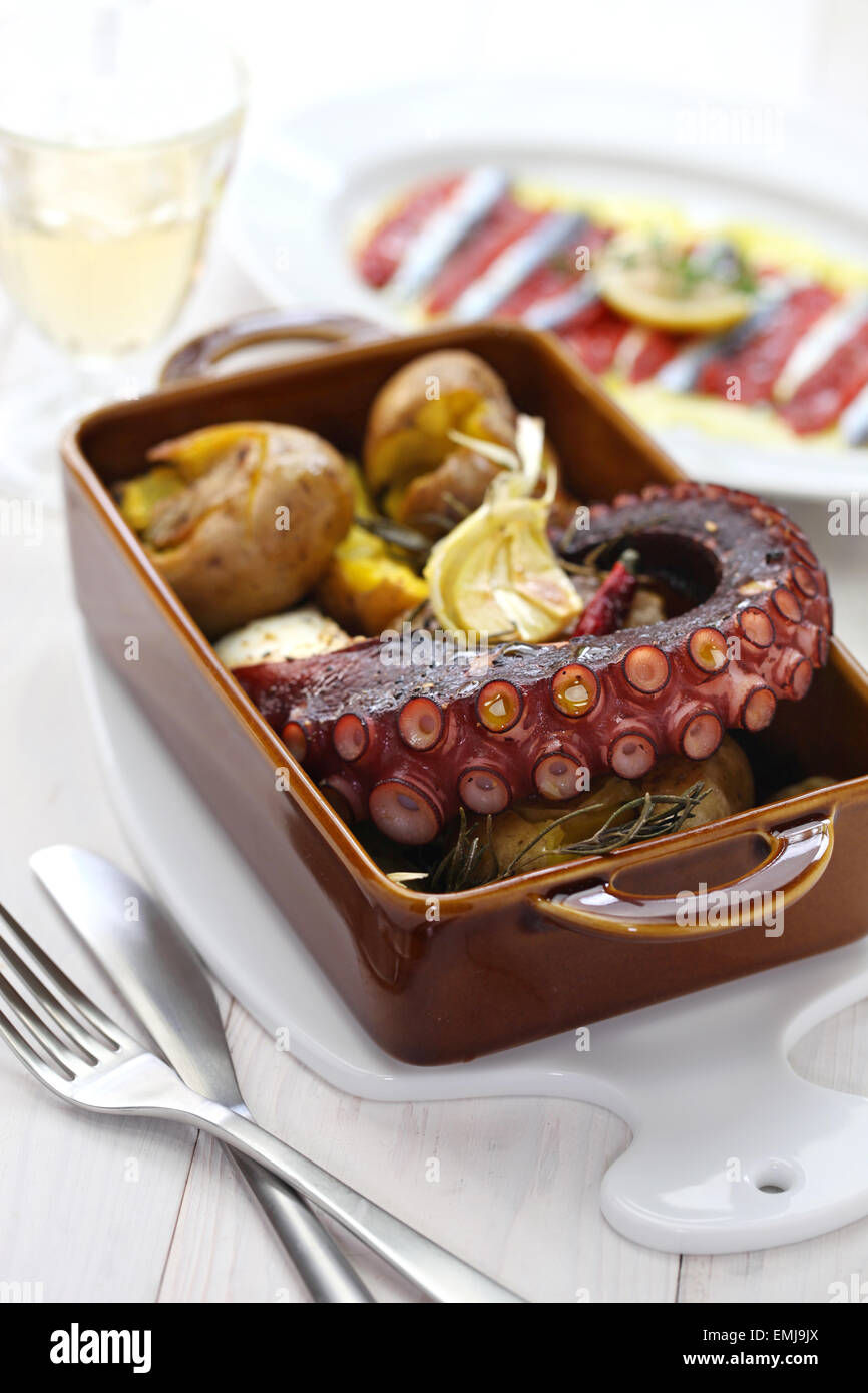 grilled octopus with potatoes, polvo a lagareiro com batata a murro, Portuguese cuisine Stock Photo