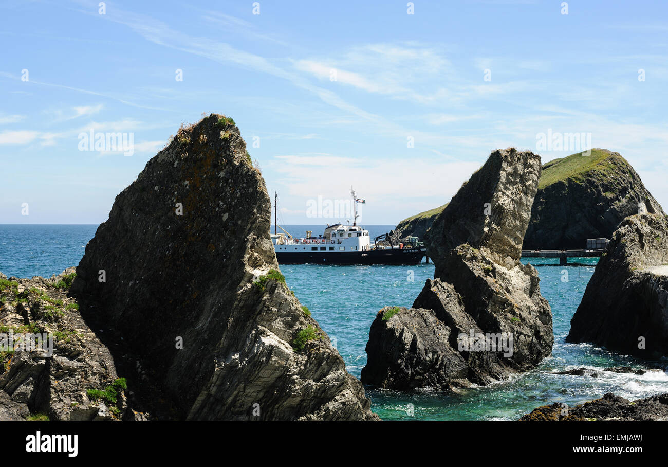 The passenger ferry MS Oldenburg docked at the pier on the island of Lundy in North Devon, England , UK Stock Photo