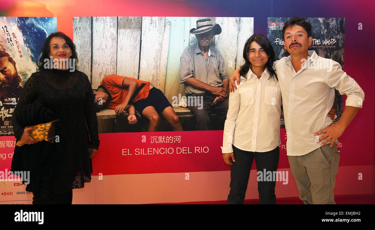 Beijing, China. 21st Apr, 2015. Director Carlos Tribino Mamby (R) and