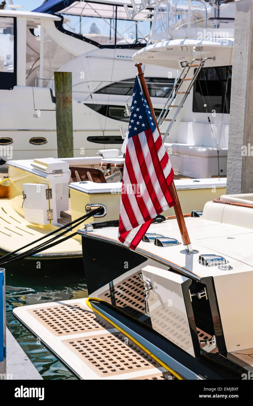 The American flag sits proudly on the back of a boat at the Suncoast boat show at the downtown waterfront Marina Jack, Sarasota Stock Photo