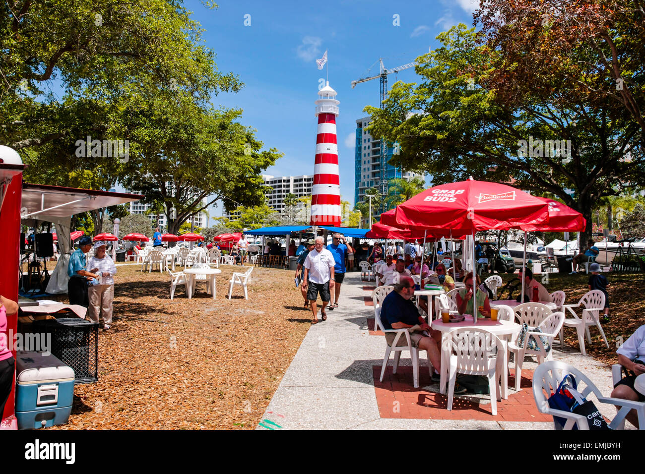 Red and white lighthouse on display with refreshments and seating at the Suncoast boat show at the downtown waterfront Marina Ja Stock Photo