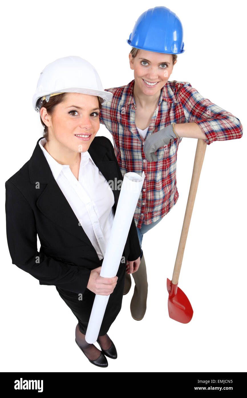 businesswoman and craftswoman posing together Stock Photo - Alamy